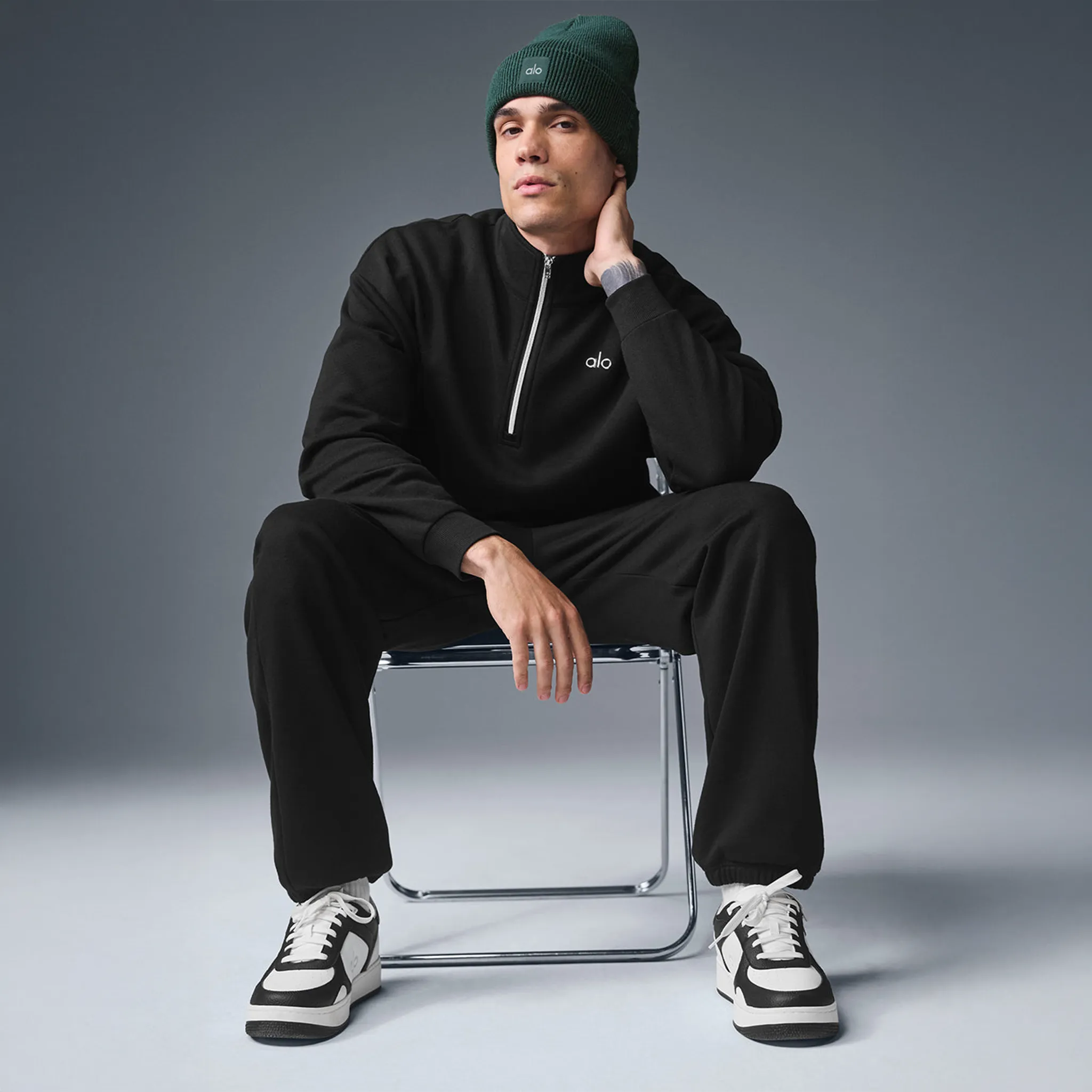 Front View of Alo Yoga Accolade 1/4 Zip Black Sweatshirt